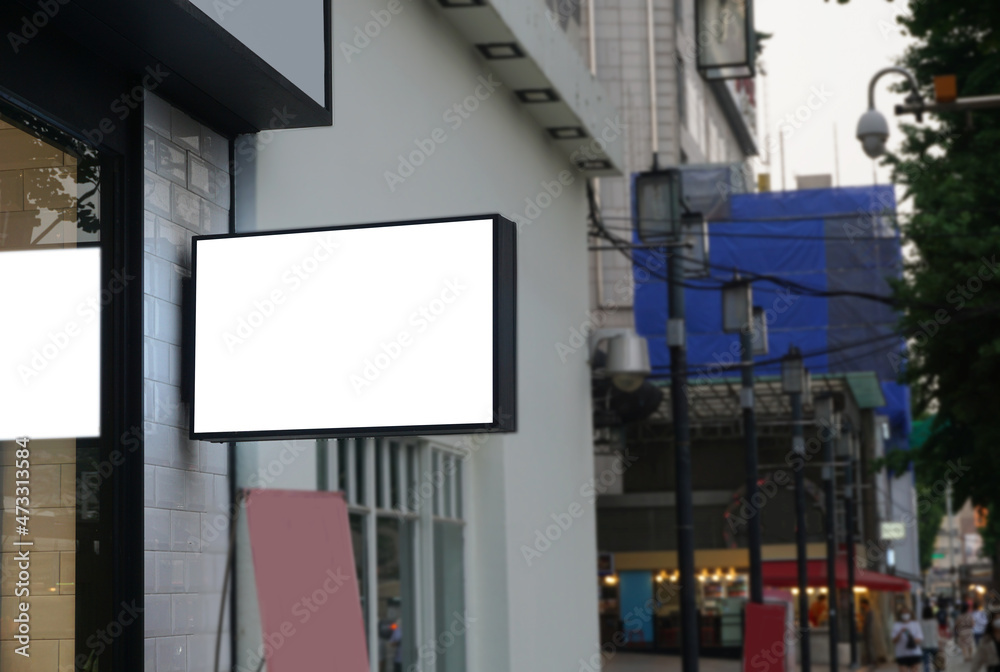 Advertising poster board outside department store Advertising poster board outside department store