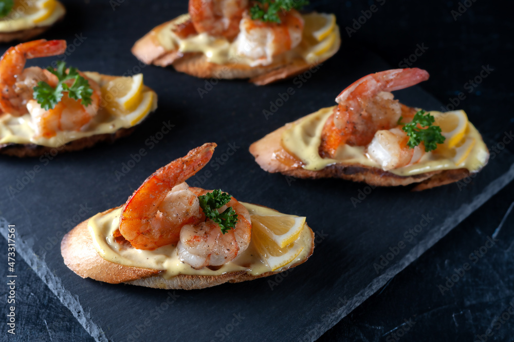 Bruschetta with shrimps, mayonnaise and micro greens. Healthy eating concept