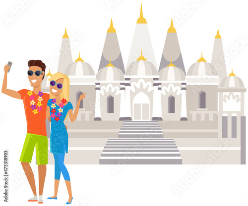 Couple of tourists taking selfie near old catholic church isolated travelers. Temple classic cathedral. Religious building in style of ancient architecture, traditional prayer house with cross on roof