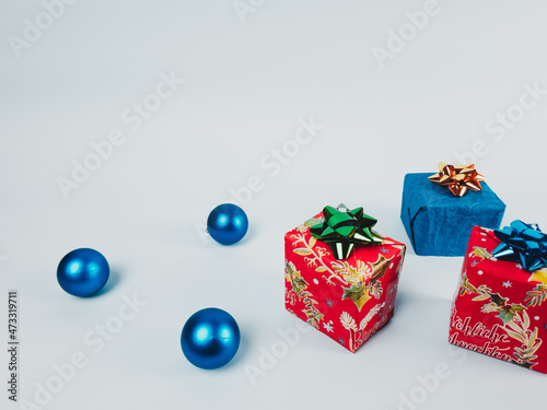 Christmas gifts and three balls
