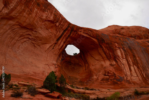 Panorama view of Bowtie Arch on the Corona Arch hiking trail after thunderstorm. Moab  Utah  USA.