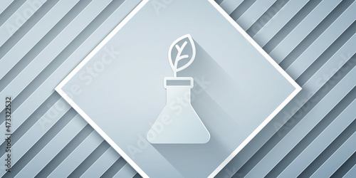 Paper cut Plant breeding icon isolated on grey background. Plants growing in the test tubes. Organic food ,agriculture and hydroponic. Paper art style. Vector