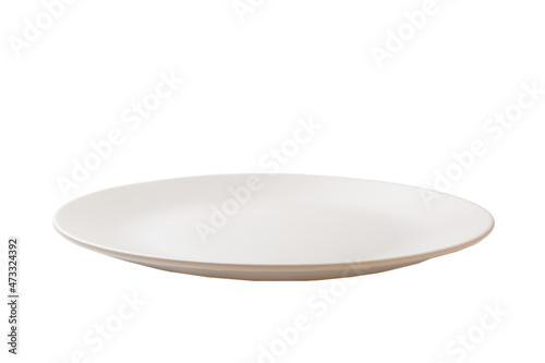 White ceramic round plate isolated over white background. perspective view © sosiukin
