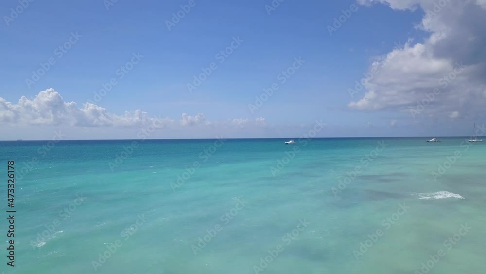Luxury yacht cruising out at sea. Aerial view of luxury yacht cruising in turquoise lagoon. Aerial drone tracking video of luxury boat. Motor Yacht sailing on open ocean Luxury yacht cruising out at sea. Aerial view of luxury yacht cruising in turquoise lagoon. Aerial drone tracking video of luxury boat. Motor Yacht sailing on open ocean