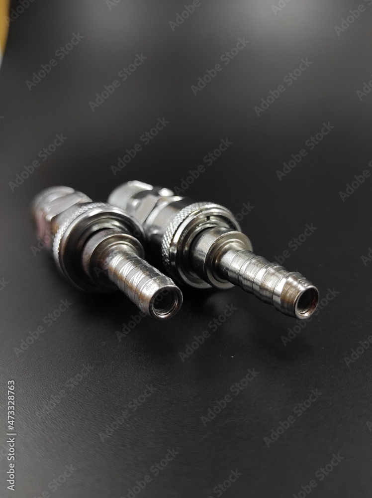 Photo of pipe hose nozzle isolated on black background, Not Focus Photo of pipe hose nozzle isolated on black background, Not Focus