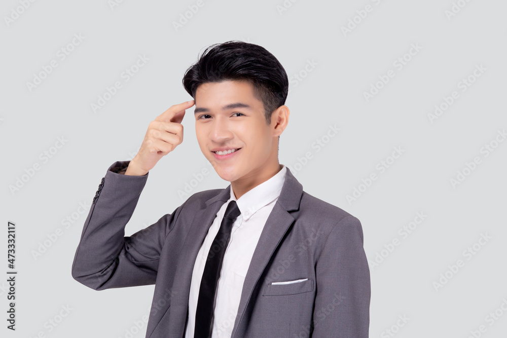 Portrait young asian business man in suit with smart thinking idea with intelligent isolated on white background, businessman standing and planning for success, manager or executive pointing head. Portrait young asian business man in suit with smart thinking idea with intelligent isolated on white background, businessman standing and planning for success, manager or executive pointing head.