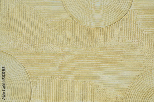 texture background texture. light beige plaster wall. design for interior decoration. stripes and circles. handmade.