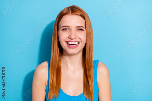 Photo portrait red haired woman smiling wearing casual outfit isolated pastel blue color background