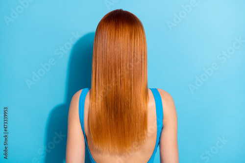 Photo of beautiful red headed young woman hair wear top singlet isolated blue color background