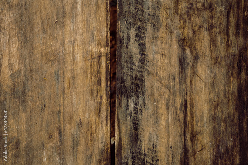 Piękne drewniane tło, brązowa zniszczona tekstura drzewa. 