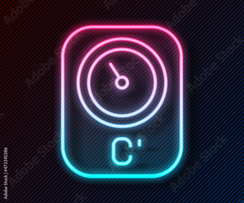 Glowing neon line Sauna thermometer icon isolated on black background. Sauna and bath equipment. Vector