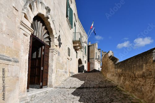 Fototapeta Naklejka Na Ścianę i Meble -  A street in Matera, an ancient city built into the rock. It is located in the Basilicata region.