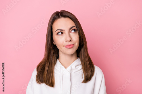 Portrait of attractive minded curious girl overthinking creating making decision isolated over pink pastel color background