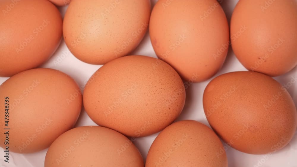 Chicken egg, rotation shot, Chicken fresh raw eggs. Many fresh raw chicken egg Chicken egg, rotation shot, Chicken fresh raw eggs. Many fresh raw chicken egg