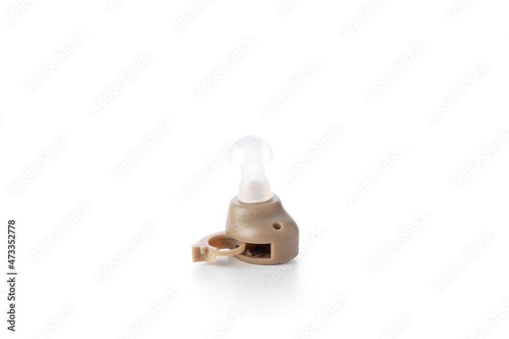 Hearing aid isolated on white background, close up Hearing aid isolated on white background, close up