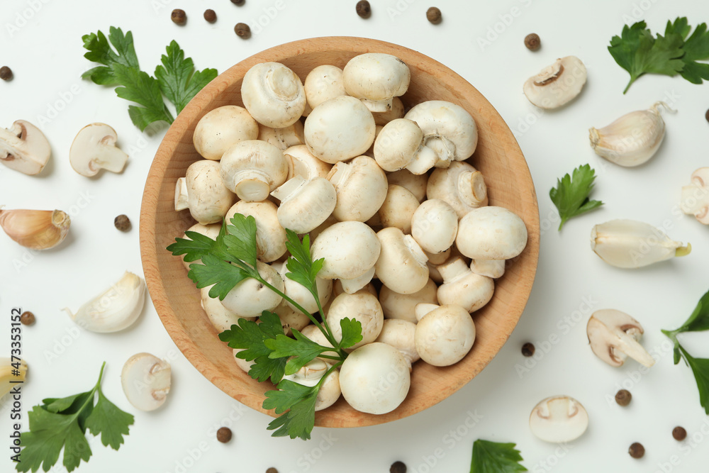 Concept of tasty food with champignon on white Concept of tasty food with champignon on white