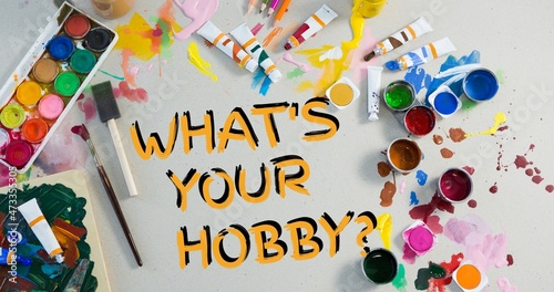 Composition of what's your hobby text with various art supplies and paints on table