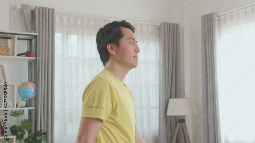 Side View Of Asian Man Training On Walking Treadmill At Home
Side View Of Asian Man Training On Walking Treadmill At Home