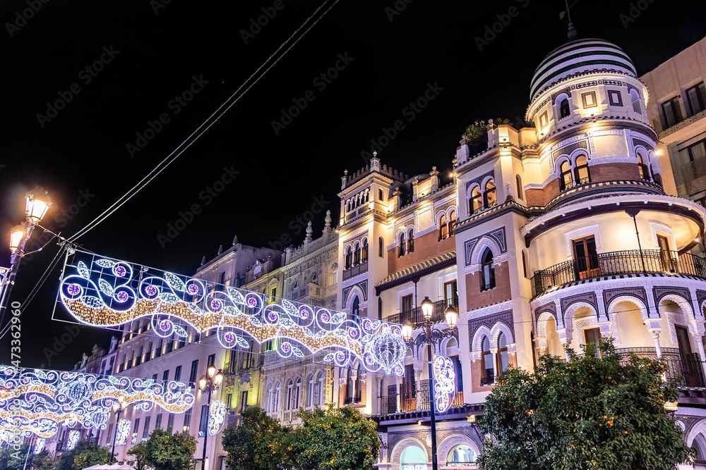 Obraz premium Christmas lights decoration Constitution avenue, Avenida de la Constitución, in Seville, Andalusia, Spain