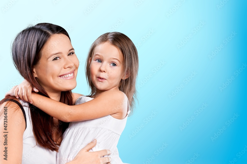 Happy Girl And Her Mom. Coronavirus Protection For Kids Concept Happy Girl And Her Mom. Coronavirus Protection For Kids Concept
