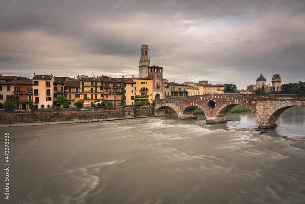 The famous Stone Bridge (Ponte di Piettra) over Adige river in Verona old town in a stormy day, Verona, Veneto Region, Italy