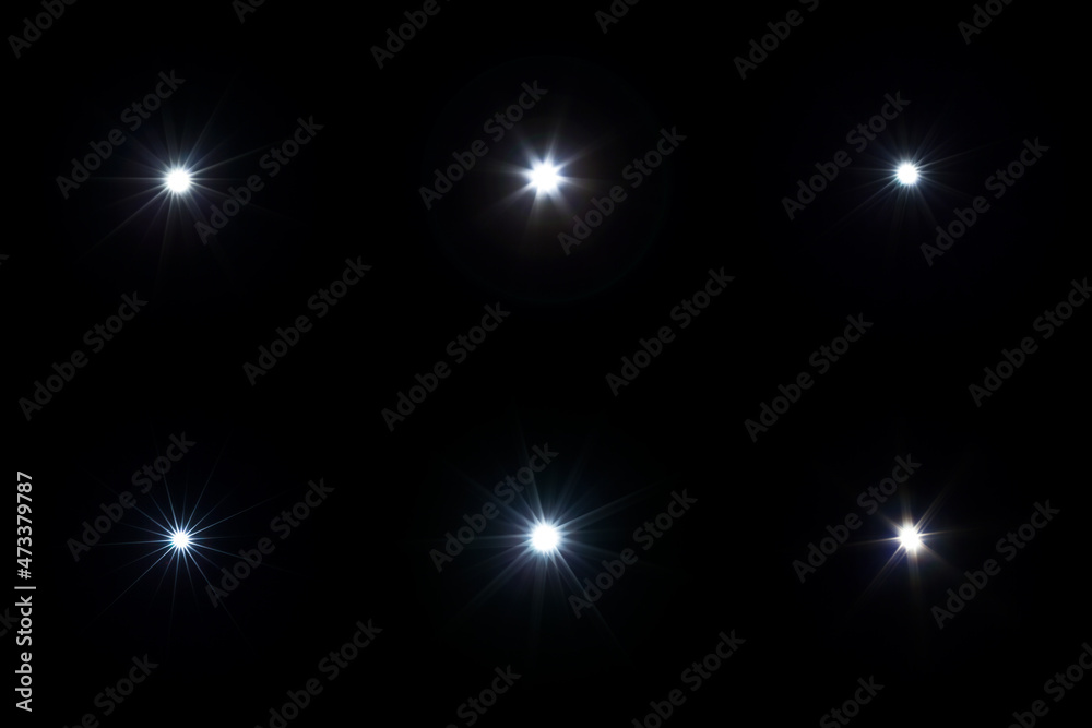 Set of flash lights with lens flare effect on black background
