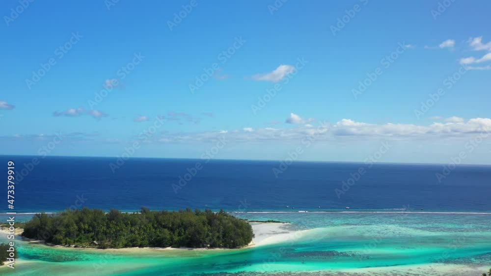Aerial Panning Idyllic Shot Of Blue And Turquoise Sea Against Sky During Sunny Day - Tahiti, French Polynesia Aerial Panning Idyllic Shot Of Blue And Turquoise Sea Against Sky During Sunny Day - Tahiti, French Polynesia