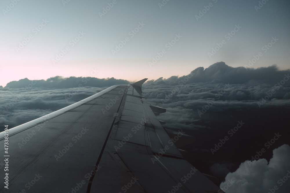 beautiful view of the plane wing and blue clouds