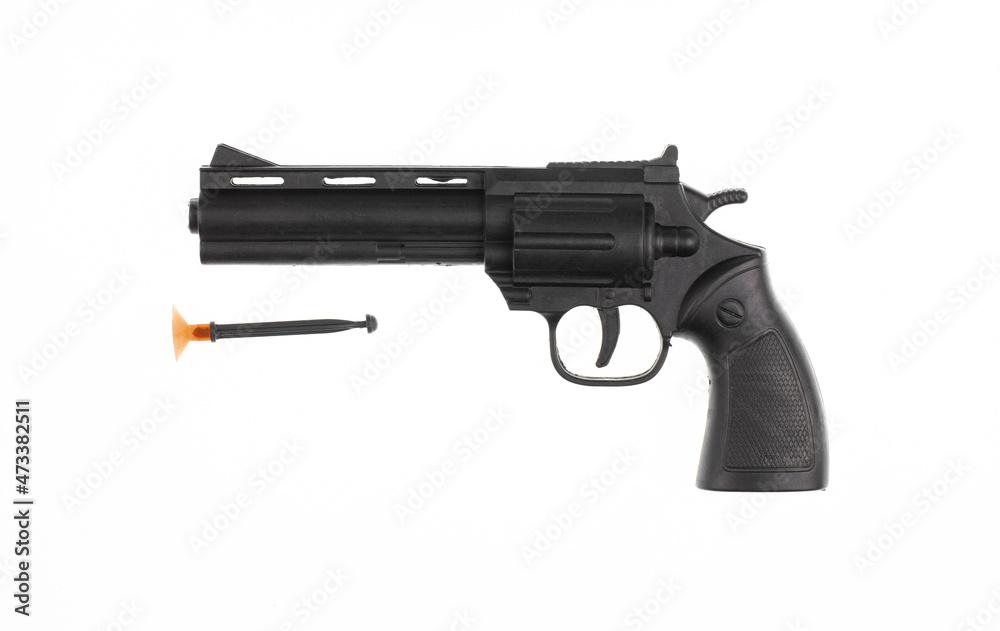 toy black plastic revolver isolated on white background toy black plastic revolver isolated on white background
