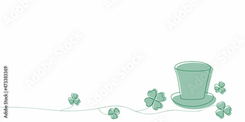 green clover and hat - traditional symbols of the holiday of st patrick on the postcard