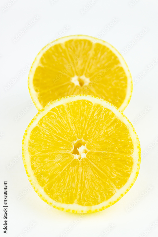 Creative layout made of lemon, half of lemon, slide, piece. Creative summer minimalistic background. Creative layout made of lemon, half of lemon, slide, piece. Creative summer minimalistic background.