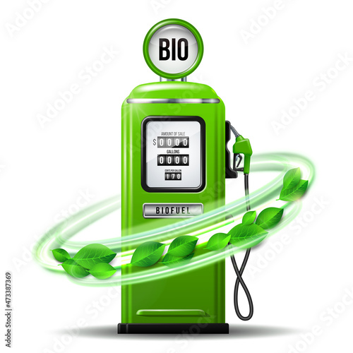 Whirlwind of green leaves swirls around Green bright Gas station pump with fuel nozzle of petrol pump.