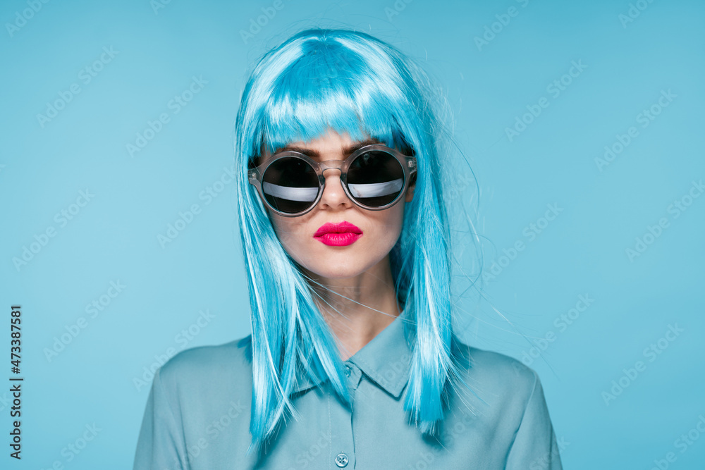 attractive woman in purple wig red glasses posing close-up attractive woman in purple wig red glasses posing close-up