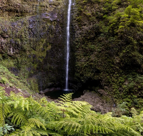 Waterfall in the Levada of Caldeirao Verde, Madeira (Portugal) Fantastic trekking footpath in mountains and rainforest.