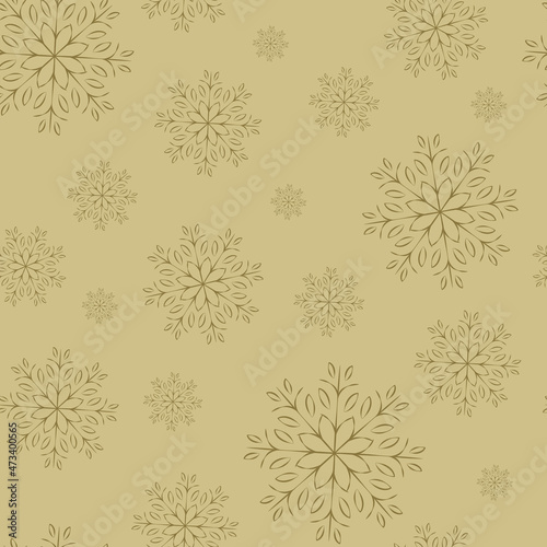 Vector seamless pattern. Openwork snowflakes on gold background.
