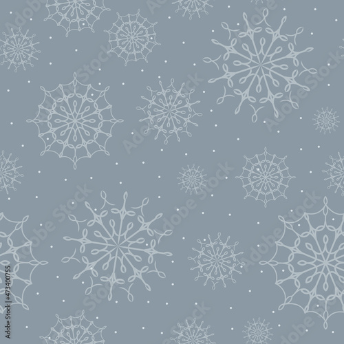 Vector seamless pattern. Snowflakes on a dark gray blue background. 