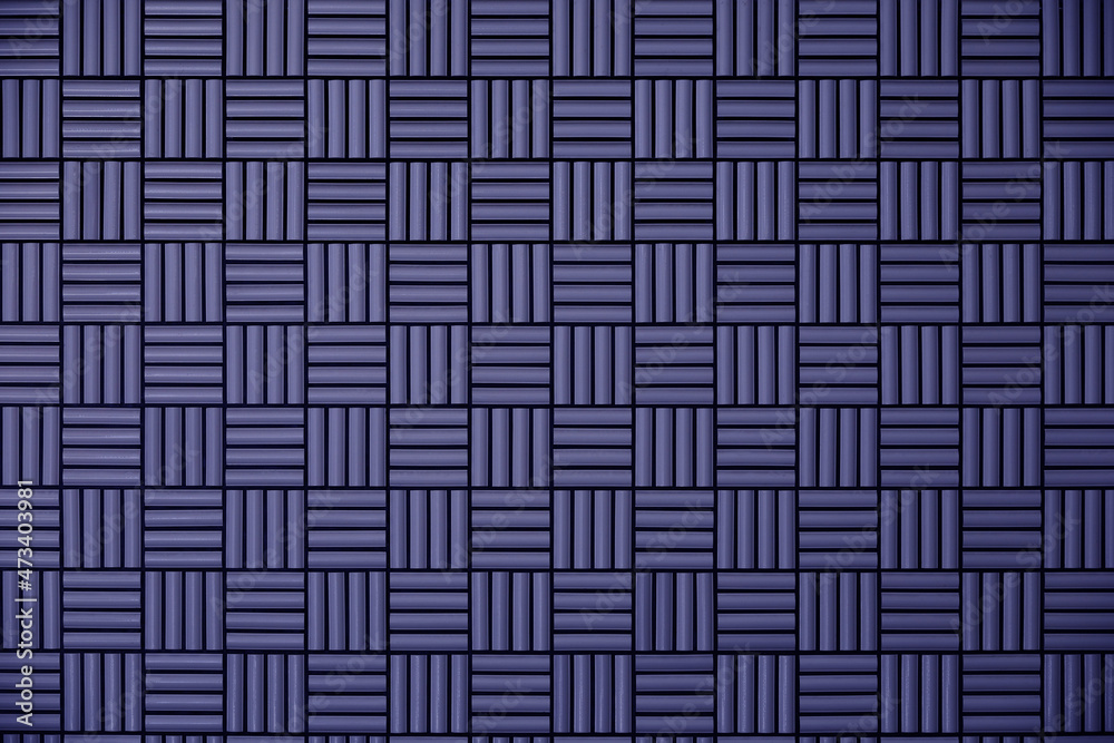 Blue tile wall with geometric pattern as background material Blue tile wall with geometric pattern as background material