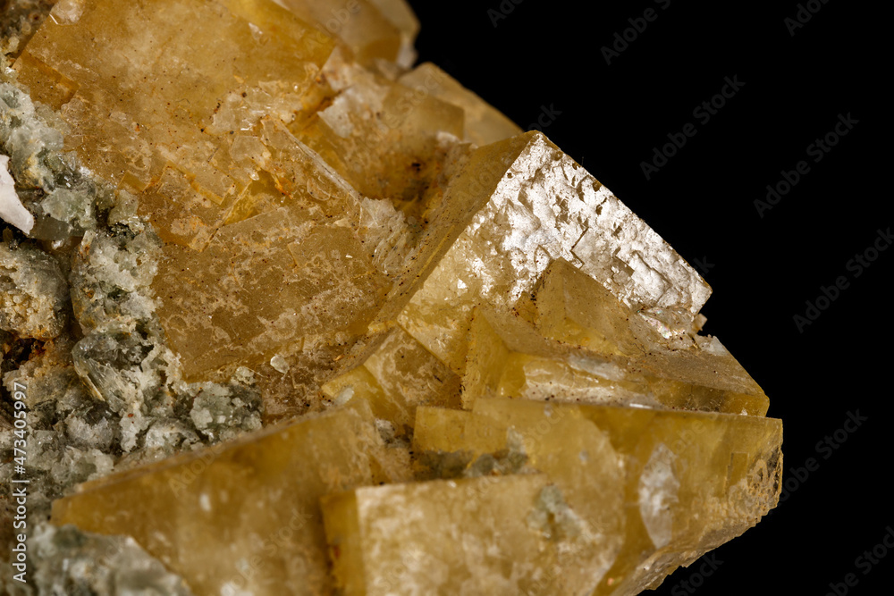 Macro stone Fluorite mineral on black background Macro stone Fluorite mineral on black background
