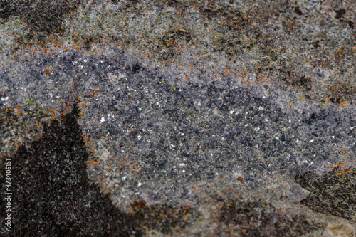 Macro stone Aegirine in charoite on white background © Minakryn Ruslan 