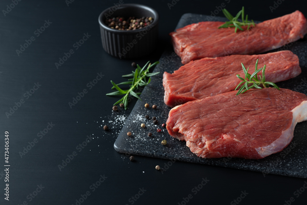 Fresh raw beef steak sirloin with rosemary