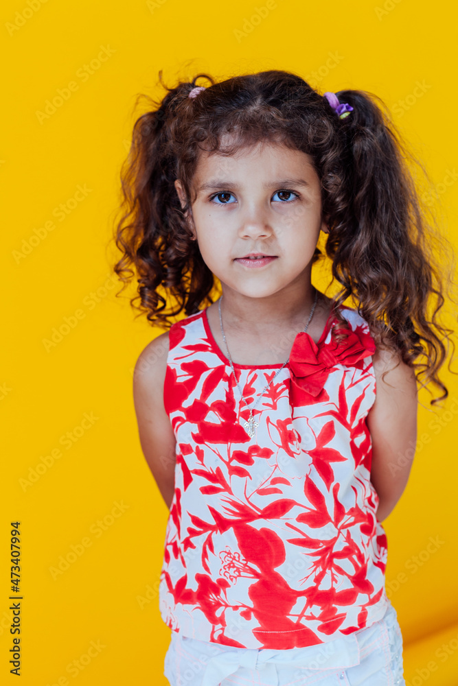 portrait of a beautiful little curly girl of 5 years portrait of a beautiful little curly girl of 5 years