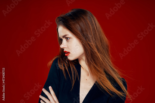 red-haired woman with red lips posing hairstyle glamor