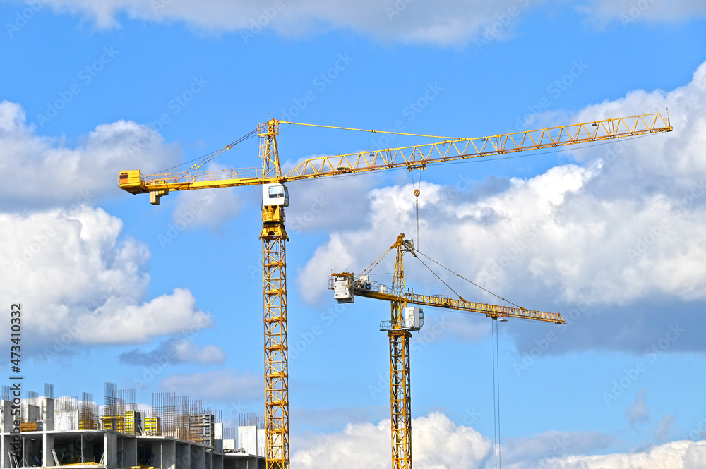 Crane and highrise construction site