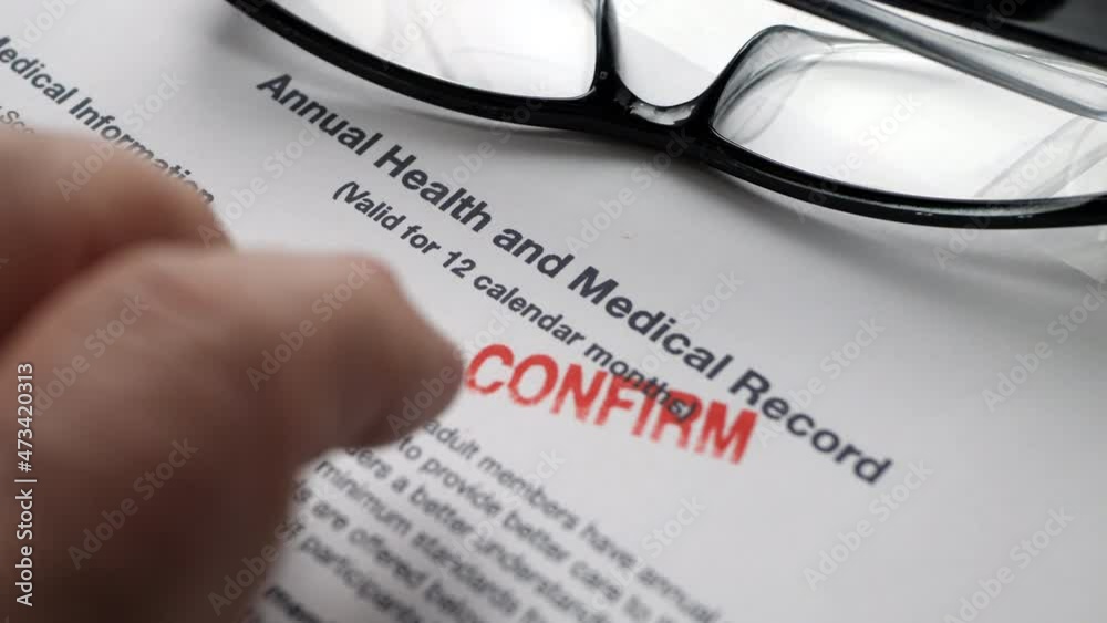 Finger tapping on health and medical report Finger tapping on health and medical report
