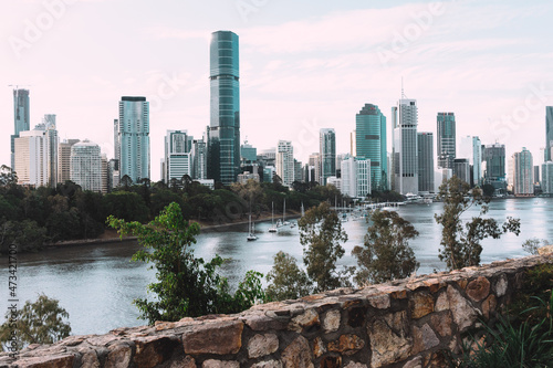 modern building with river in brisbane