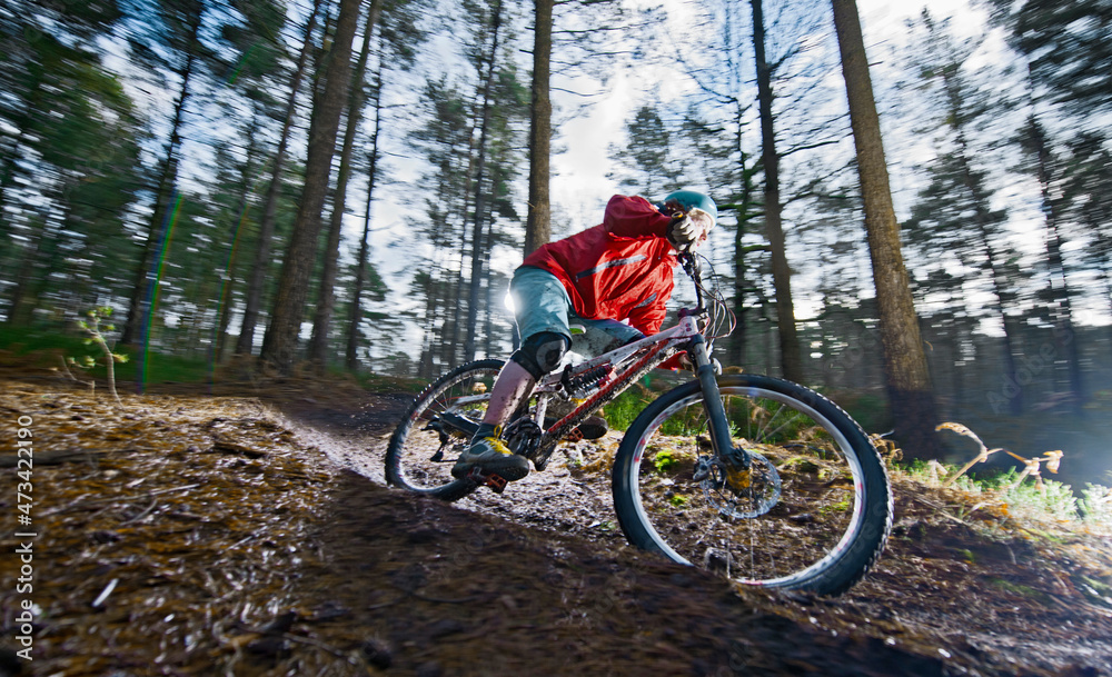 man on mountainbike riding in the hills of Surrey / England man on mountainbike riding in the hills of Surrey / England