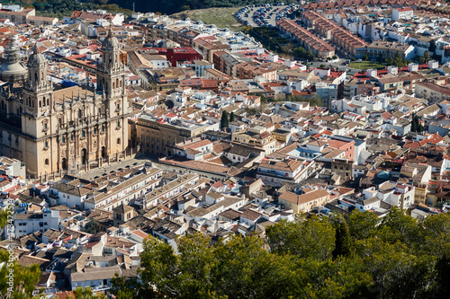 View of the facade of the Gothic cathedral of Jaén (Spain) from the Cross located in the Castillo de Santa Catalina, on a sunny morning in autumn