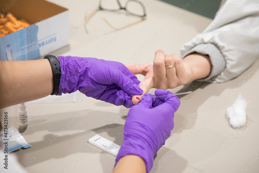 Nurse tests a person for Covid-19. Nurse tests a person for Covid-19.