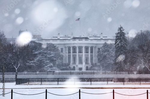 Snow blankets the South Lawn of the White House in Washington, DC. photo