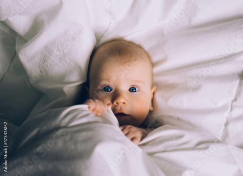 a baby in the bed photo